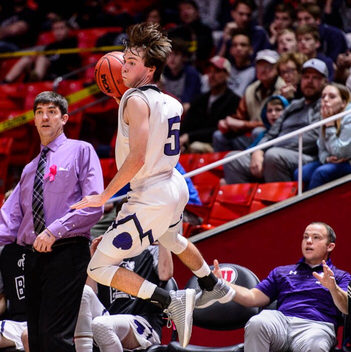 (Trent Nelson | The Salt Lake Tribune)  Box Elder vs. Corner Canyon, 5A State high school basketball tournament at the Huntsman Center in Salt Lake City, Wednesday Feb. 28, 2018. Box Elder's Cameron Saunders (5) leaps for a save.