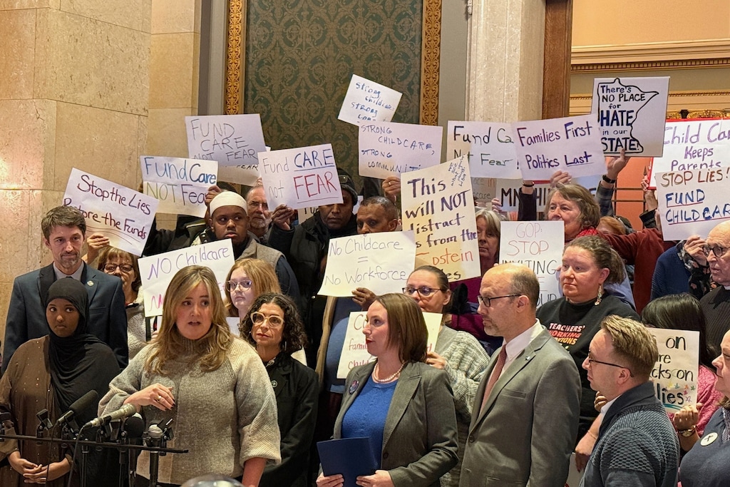 Maria Snider, director of the Rainbow Child Development Center and vice president of advocacy group Minnesota Child Care Association, speaks as people gather for a news conference at the state capitol in St. Paul, Minn., on Wednesday, Dec. 31, 2025. (AP Giovanna Dell'Orto)