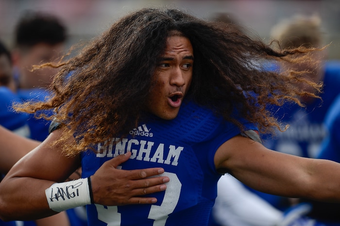 (Francisco Kjolseth  |  The Salt Lake Tribune)  Lolani Langi of Bingham gets the team pumped up before their game against Herriman in their class 6A semifinal game at Rice-Eccles Stadium, Friday, Nov. 10, 2017.