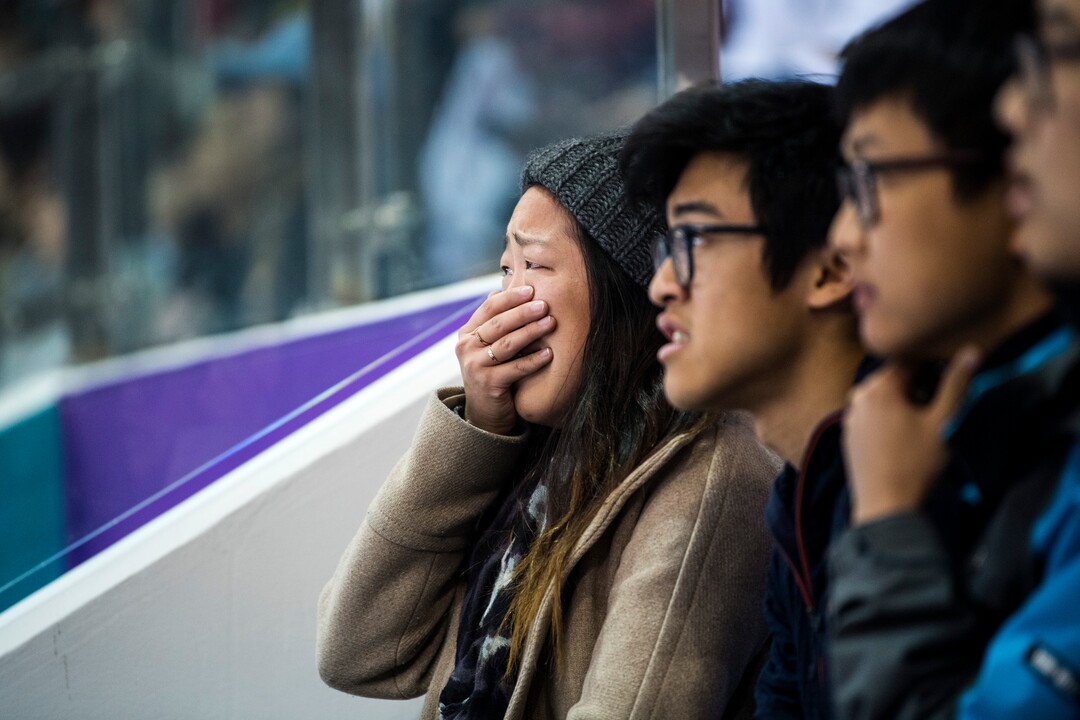 (Chris Detrick  |  The Salt Lake Tribune)  Nathan Chen's sister Alice Chen, left, reacts as his score is announced in the Men Single Skating Free Skating at Gangneung Ice Arena during the Pyeongchang 2018 Winter Olympics Saturday, Feb. 17, 2018. Chen landed a record six quadruple jumps, scoring 215.08. At right is his brother Colin Chen and cousins Kevin Wang and Jerome Wang.