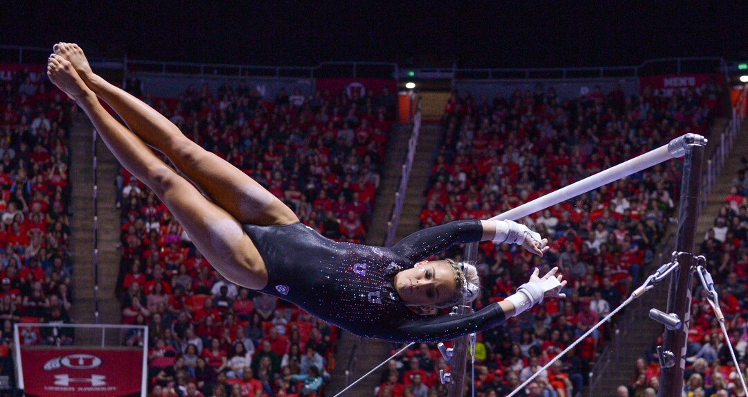 (Leah Hogsten  |  The Salt Lake Tribune)   MyKayla Skinner flies between the bars during her routine. The fourth-ranked Utes compete against No. 9 California, No. 16 Auburn, No. 21 Brigham Young, Stanford and Southern Utah, during the the NCAA Regional Championships, Saturday, April 7, 2018 at the Huntsman Center. The top two teams advance to the NCAA Championships April 20-21 in St. Louis.