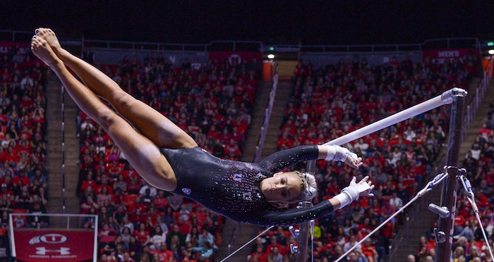 (Leah Hogsten  |  The Salt Lake Tribune)   MyKayla Skinner flies between the bars during her routine. The fourth-ranked Utes compete against No. 9 California, No. 16 Auburn, No. 21 Brigham Young, Stanford and Southern Utah, during the the NCAA Regional Championships, Saturday, April 7, 2018 at the Huntsman Center. The top two teams advance to the NCAA Championships April 20-21 in St. Louis.

