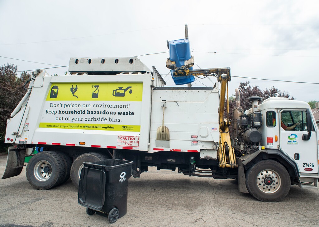 (Rick Egan | Tribune file photo)  A truck collects recycled material in Sugarhouse for the Wasatch Front Waste and Recycling District, Friday, July 26, 2019.