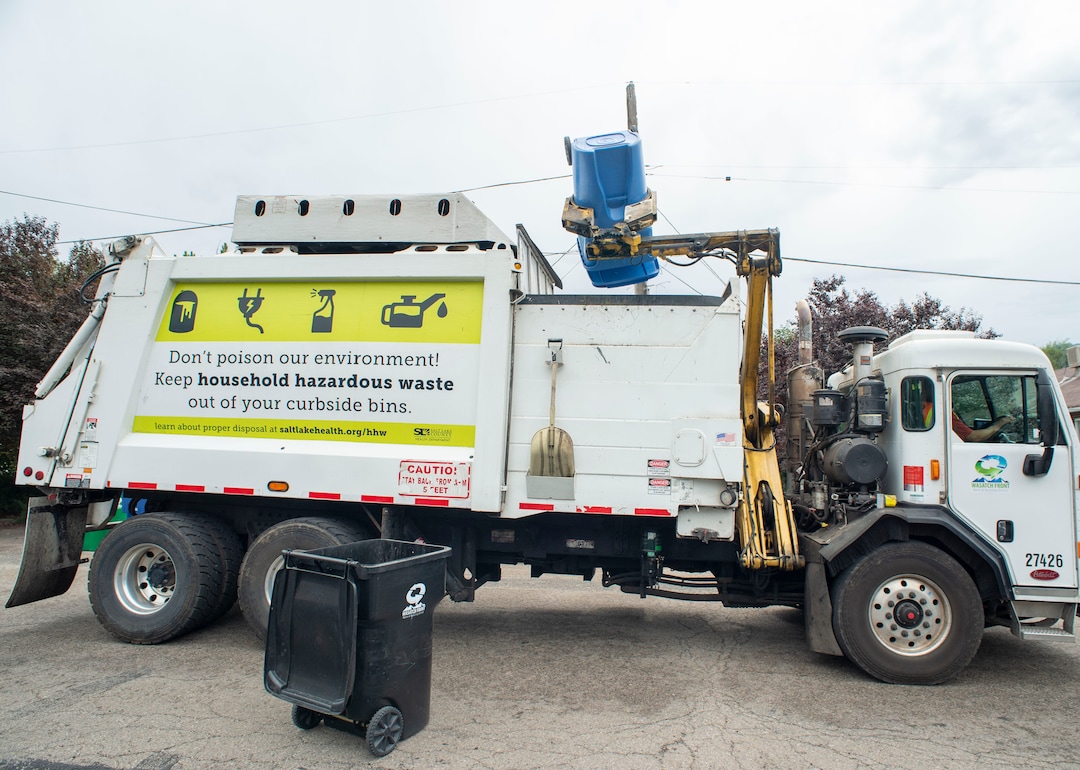 (Rick Egan  |  The Salt Lake Tribune) A recycle truck collects recycled material in Sugarhouse for the Wasatch Front Waste and Recycling District on Friday, July 26, 2019.