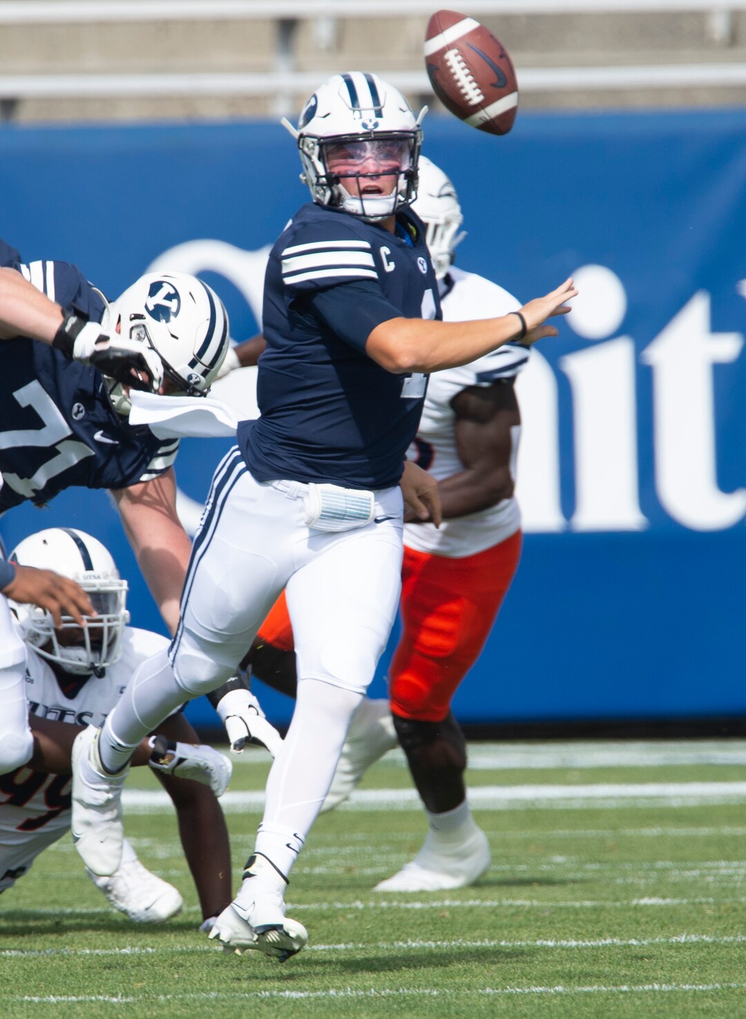 (Rick Egan  |  The Salt Lake Tribune)   Brigham Young Cougars quarterback Zach Wilson (1)  tosses a shovel pass to Brigham Young Cougars tight end Masen Wake (13), in football action between the Brigham Young Cougars and the UTSA Roadrunners, at Lavell Edwards stadium, Saturday, Oct. 10, 2020.