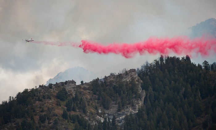 (Francisco Kjolseth  |  The Salt Lake Tribune) Air crews battle a fire in Neffs Canyon on the north side of Mount Olympus on Tuesday, Sept, 22, 2020.