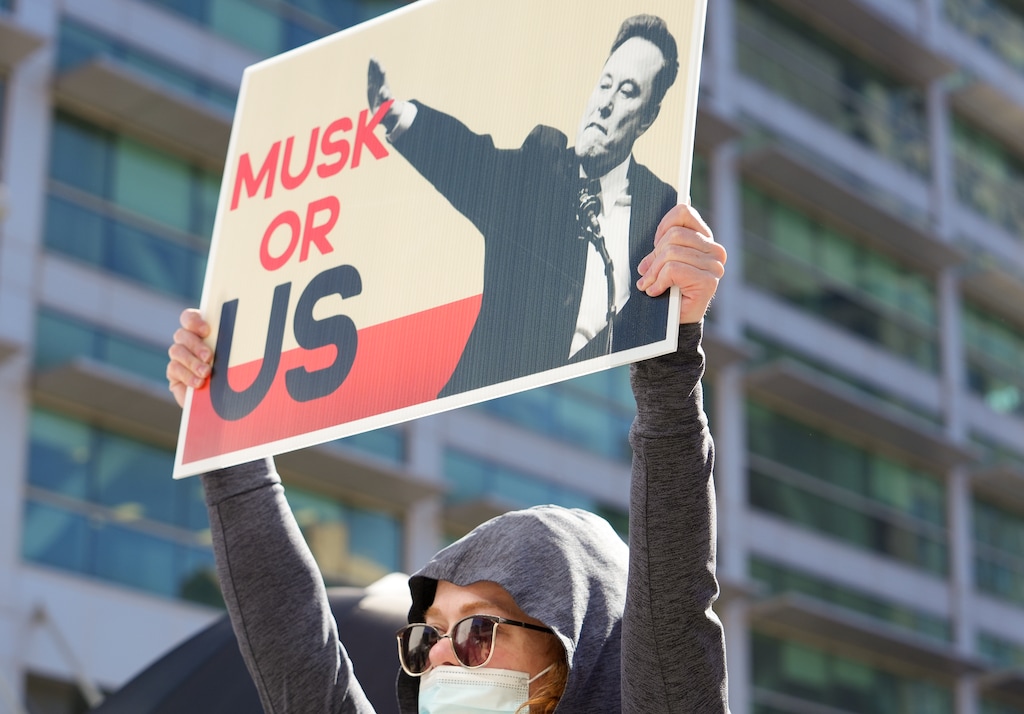 (Chris Samuels | The Salt Lake Tribune) People participate in a protest against Elon Musk and the Trump administration outside the Wallace F. Bennett Federal Building in Salt Lake City, Wednesday, Feb. 26, 2025.