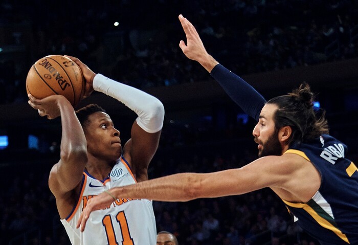 New York Knicks' Frank Ntilikina, left, shoots next to Utah Jazz's Ricky Rubio, right, during the first half of an NBA basketball game at Madison Square Garden in New York, Wednesday, Nov. 15, 2017. (AP Photo/Andres Kudacki)