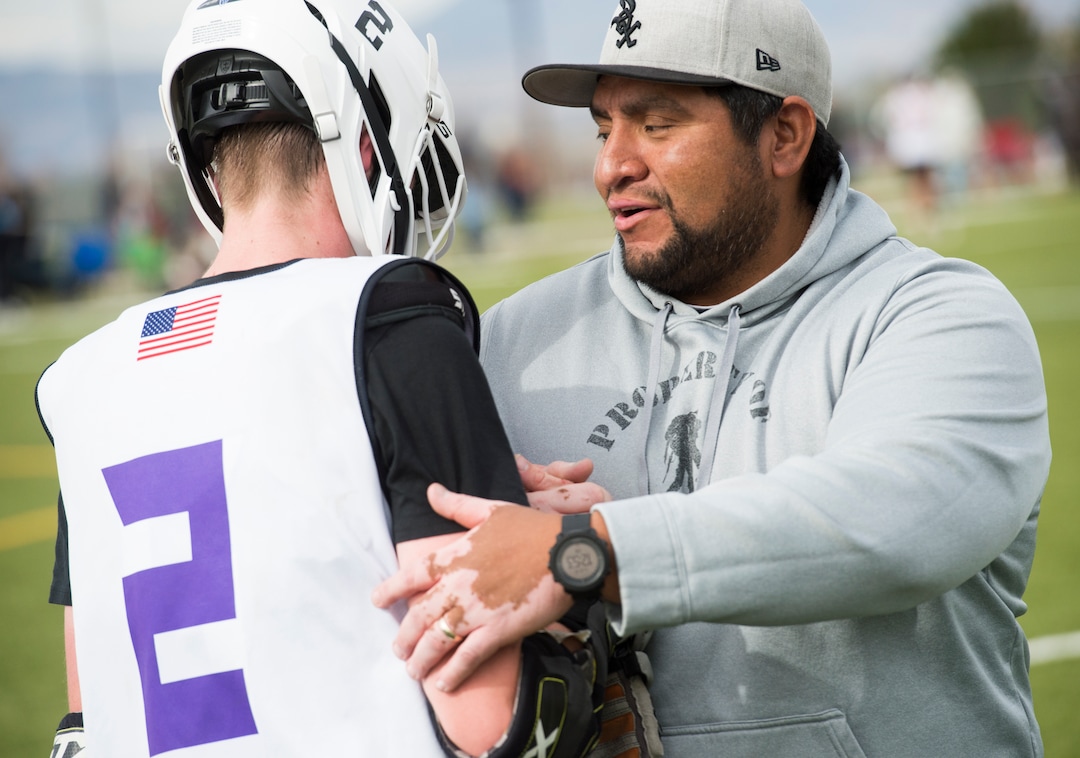 (Rick Egan | The Salt Lake Tribune) Player Cru Andreasen talks to Box Elder lacrosse coach Juan Gaytan during a tournament in Logan on Saturday, Nov. 3, 2018.