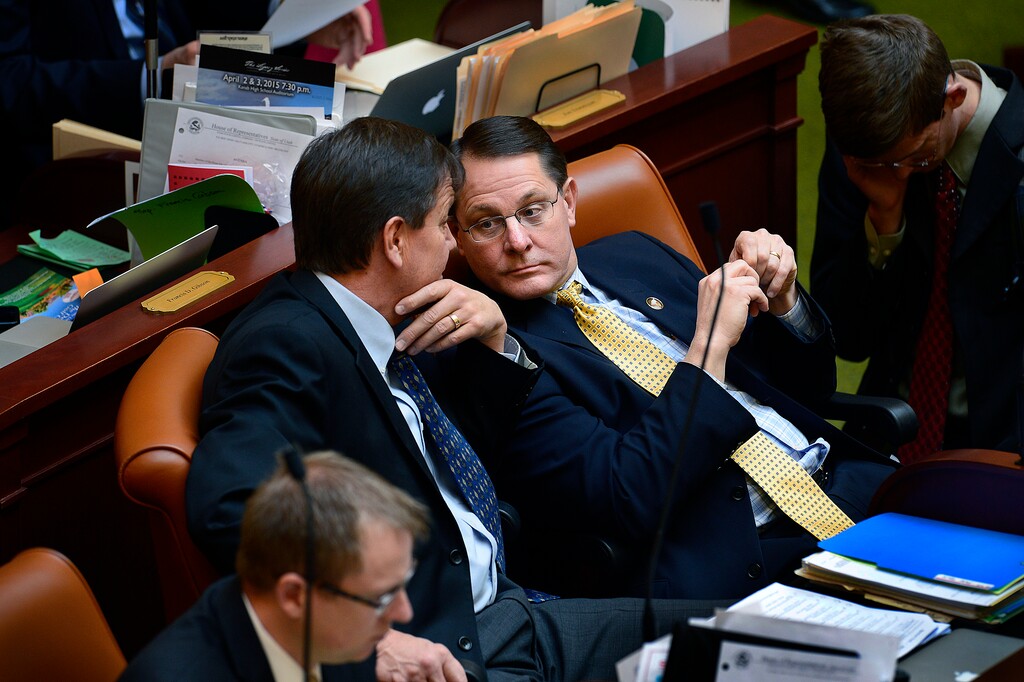 Scott Sommerdorf | The Salt Lake Tribune
Rep. Ken Ivory, R-West Jordan, right, speaks with Rep. Keven Stratton, R-Orem, in the Utah House of Representatives, Thursday, February 19, 2015.