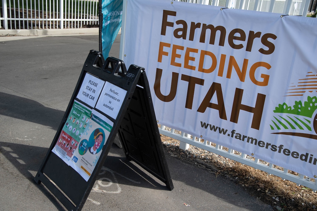 (Francisco Kjolseth  |  The Salt Lake Tribune) The third “Miracle Project” for the nonprofit foundation which raises money to purchase food produced by Utah farmers and then gives to residents in need, takes place at the Utah State Fairpark in Salt Lake City on Monday, July 27, 2020. The food donation from the Utah Farm Bureau’s “Farmers Feeding Utah” program provided food for 600 individuals and families who have recently become unemployed due to the coronavirus.