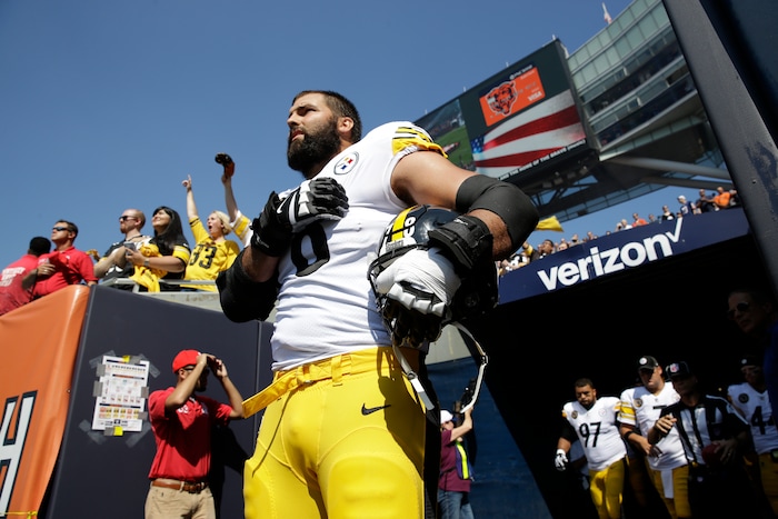 Pittsburgh Steelers offensive tackle and former Army Ranger Alejandro Villanueva (78) stands outside the tunnel alone during the national anthem before an NFL football game against the Chicago Bears, Sunday, Sept. 24, 2017, in Chicago. (AP Photo/Nam Y. Huh)