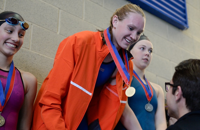 (Francisco Kjolseth | The Salt Lake Tribune) Rachel Butler of Brighton celebrates her first place win in the Women 200 Yard IM at the high school swimming 5A State Championships in Bountiful, Friday February 9, 2018.