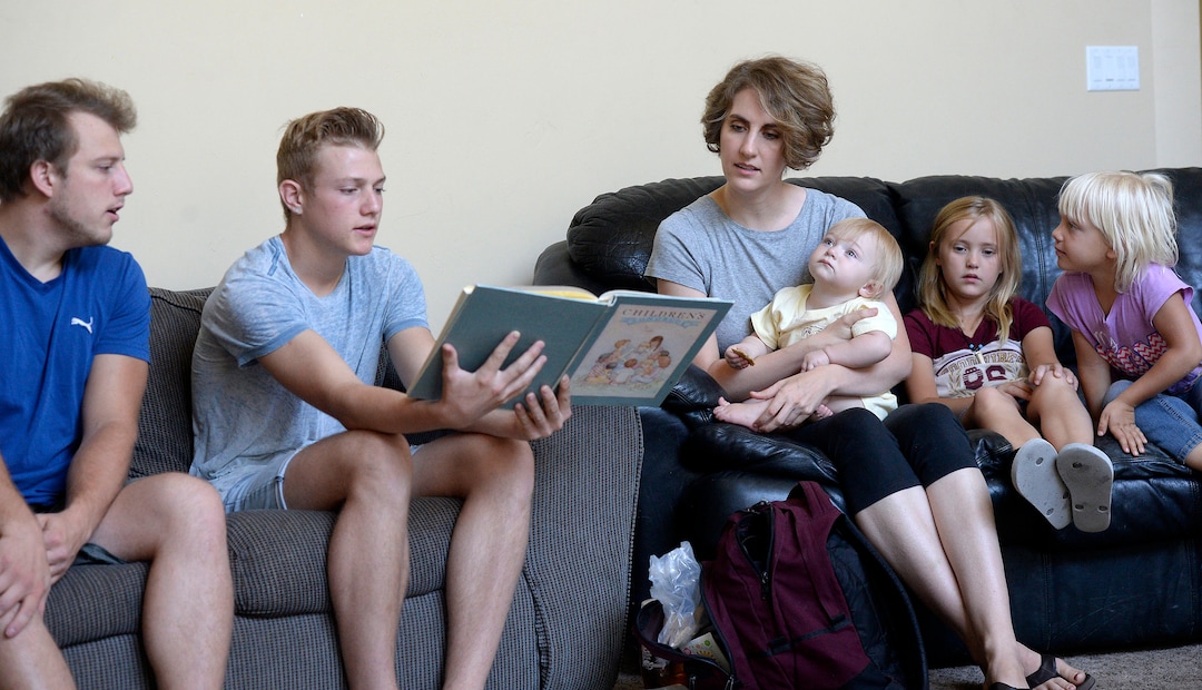 (Al Hartmann  |  The Salt Lake Tribune)
Believers in Denver Snuffer's Remnant movement gather in a Sandy home for a fellowship meeting Sunday, Aug. 13, to sing songs and partake of the sacrament.