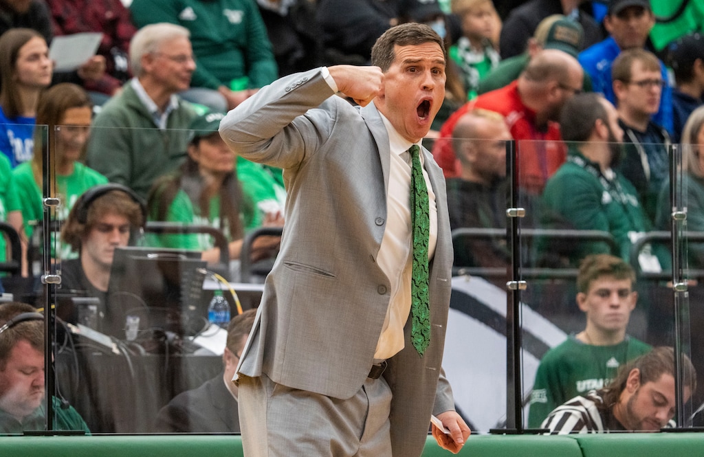 (Rick Egan | The Salt Lake Tribune) Utah Valley Wolverines head coach Mark Madsen shouts directions to his team, in basketball action, between the Brigham Young Cougars and the Utah Valley Wolverines in Orem, on Wednesday, Dec. 1, 2021.