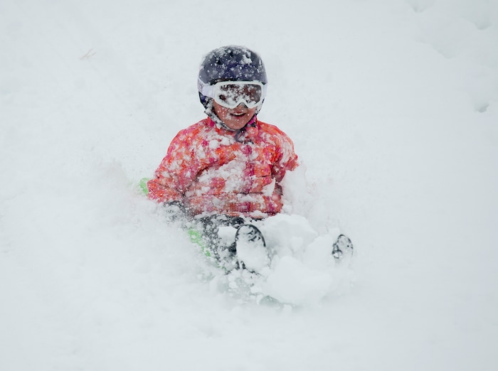 (Rick Egan  |  The Salt Lake Tribune)      
Desmond Fehlberg 7, sleds down the hill at Popperton Park, Monday, Jan. 21, 2019.


