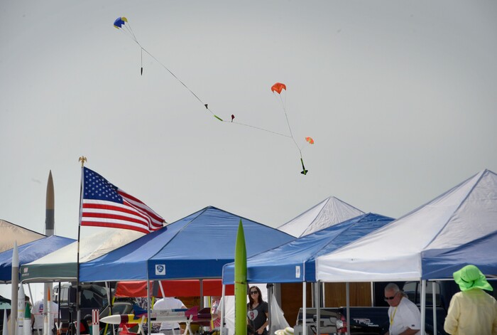 (Scott Sommerdorf   |  The Salt Lake Tribune)   A rocket is brought back down to Earth with a successful parachute deployment at HellFire, sponsored by the Utah Rocket Club, Saturday, August 5, 2017.  