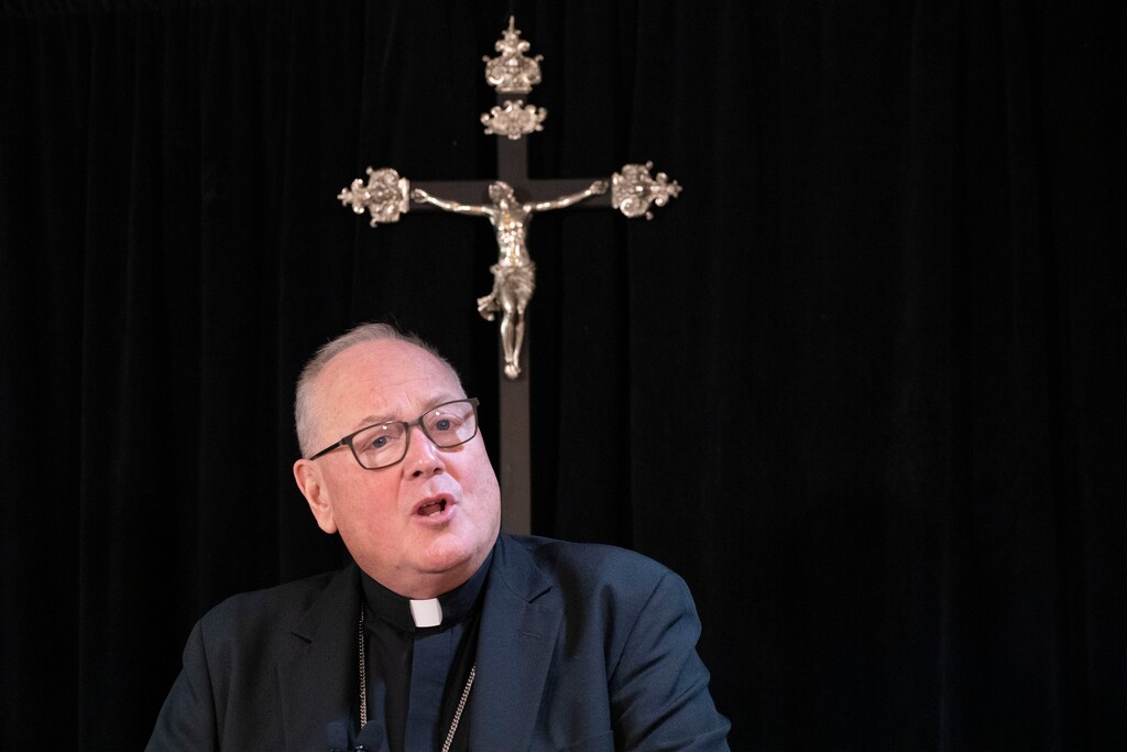 (Mark Lennihan | The Associated Press) - Cardinal Timothy Dolan, archbishop of New York, speaks during a news conference, Monday, Sept. 30, 2019 in New York. In November 2022, Dolan, chairman of the Catholic bishops’ Committee for Religious Liberty, dismissed a bill pending in the Senate that would protect same sex and interracial marriages in federal law, as failing even the “meager goal” of preserving the status quo in balancing religious freedom with the right to same-sex marriage.