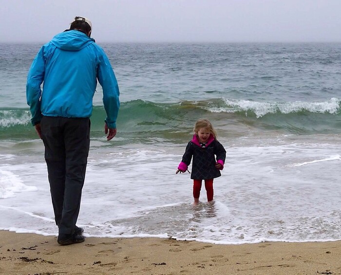 (Mary Demorest | Courtesy image) The author's daughter, Saskia, plays with her family on a beach Sept. 29, 2015 at Acadia National Park.