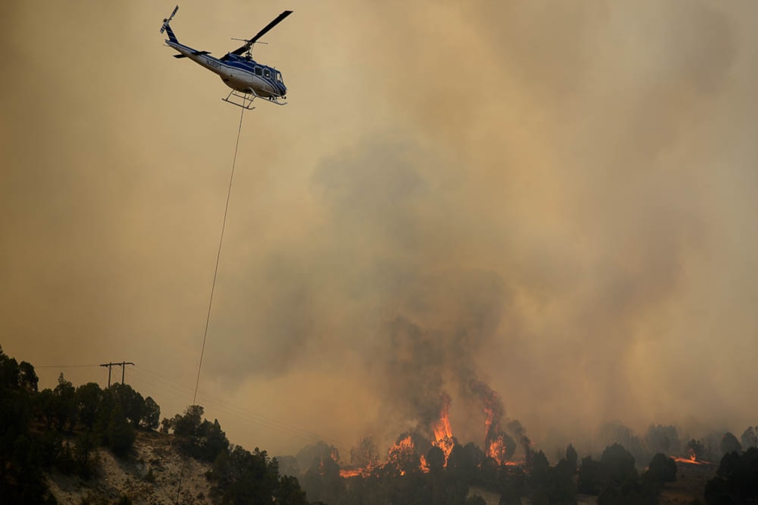 (Trent Nelson | The Salt Lake Tribune) The Coal Hollow Fire burns along Highway 6 in Utah County, Thursday Aug. 9, 2018.