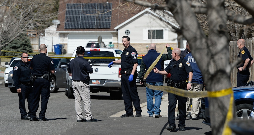 (Francisco Kjolseth  |  The Salt Lake Tribune)  Investigators comb the scene where a Granite School District police officer shot a driver on Tuesday afternoon, March 20, 2018. While on patrol near Hunter High School, the officer noticed a car full of teenagers and smelled marijuana. When he approached, the car lurched and he ended up on the hood. The driver was shot and four other teens in the car fled the scene.