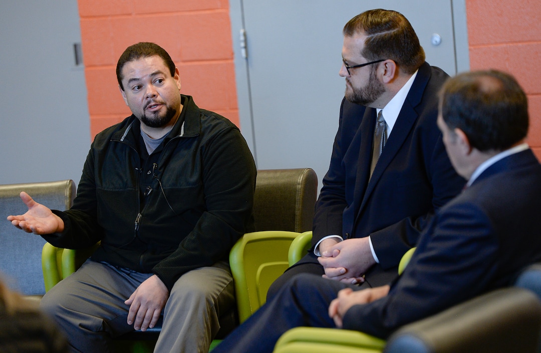 (Francisco Kjolseth  |  The Salt Lake Tribune) Don Gurule, left, a counselor at Decker Youth Center in West Valley City speaks with Juvenile Justice Services Director Brett Peterson, center, and Gov. Gary Herbert during a tour of the facility on Wednesday, Jan. 15, 2020, to discuss its success after juvenile justice reforms were passed in 2017.