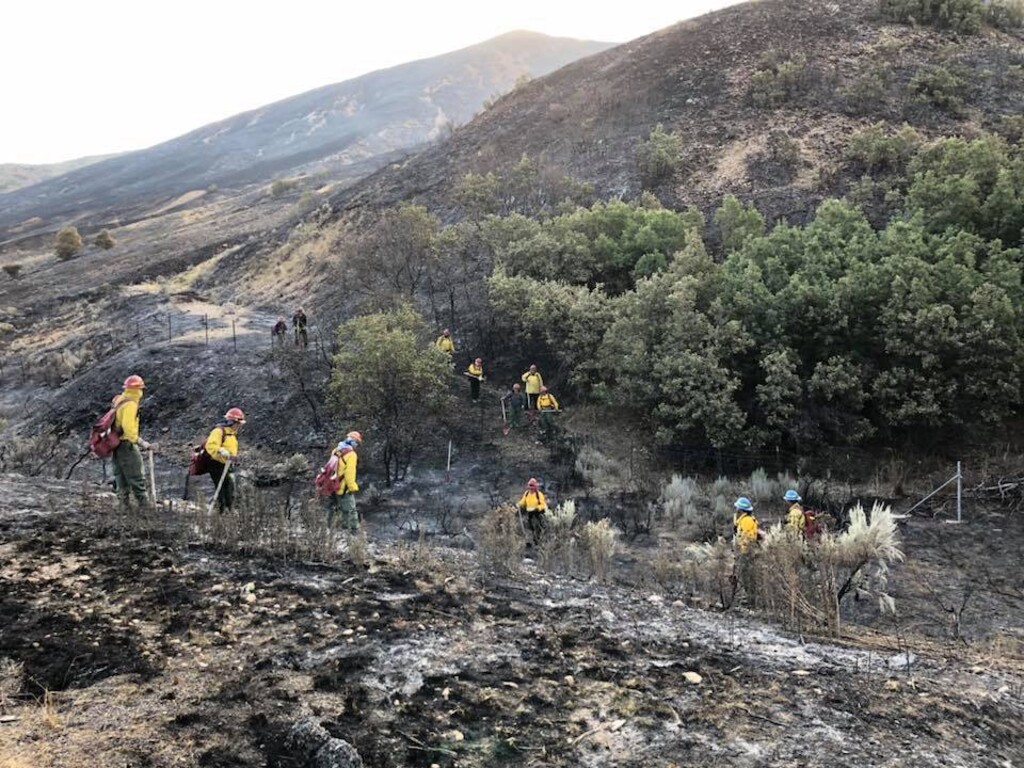 (Photo courtesy Utah Fire Info) A crew battles the Tervels fire about 6.5 miles northeast of Coalville.