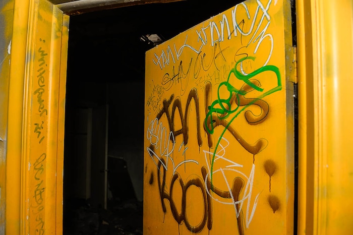 (Trent Nelson | The Salt Lake Tribune) A dilapidated, fire-damaged building near 100 South 700 East in Salt Lake City, Thursday Feb. 15, 2018. Other Side Academy has received approval to demolish it for their expansion.