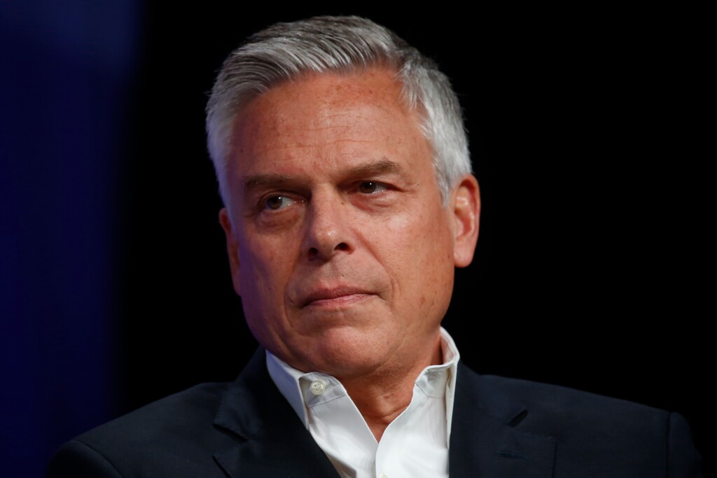 In this May 20, 2020 photo, Republican Utah gubernatorial candidate and former ambassador Jon Huntsman Jr. looks on during a debate in Salt Lake City. Huntsman says he has tested positive for COVID-19. Huntsman said Wednesday, June 10, 2020, he is experiencing "classic symptoms" of the illness caused by the coronavirus, and will isolate himself while his campaign continues. (AP Photo/Rick Bowmer)