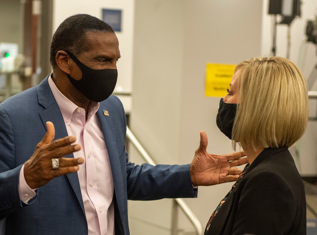 (Rick Egan | The Salt Lake Tribune) Burgess Owens chats with Aimee Winder Newton, at the Utah Association of Realtors office in Sandy, on Tuesday, Nov. 3, 2020.