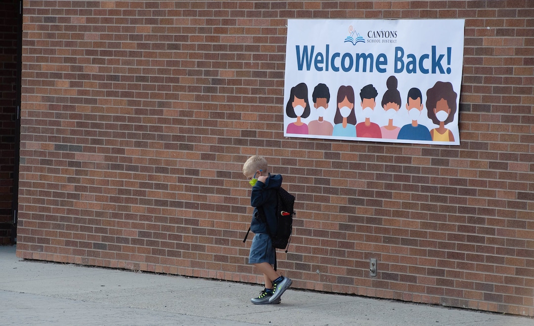 (Francisco Kjolseth  |  The Salt Lake Tribune) A student makes his way to the back of the school at Canyon View Elementary in Cottonwood Heights where they lined up on the playground for the first day of classes for the Canyons School District on Monday, August 24, 2020.