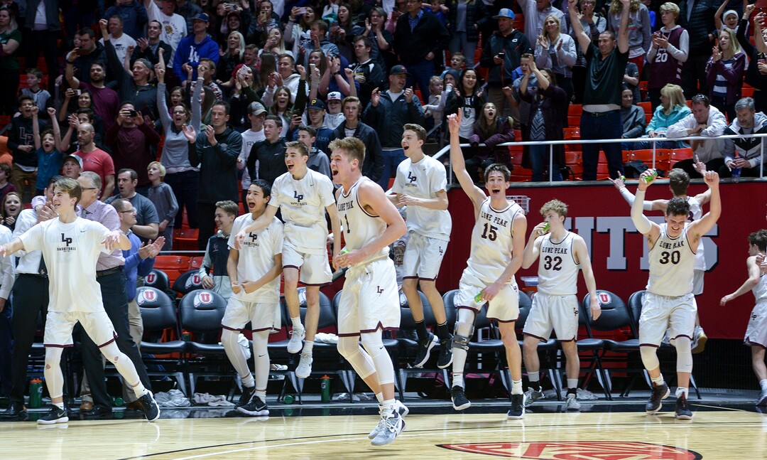 (Leah Hogsten  |  The Salt Lake Tribune) Lone Peak celebrates the win. Lone Peak defeated Pleasant Grove 61-44 to win the 6A High School BoysÕ Basketball Tournament Championship at the Jon M. Huntsman Center in Salt Lake City, Saturday, March 3, 2018. 