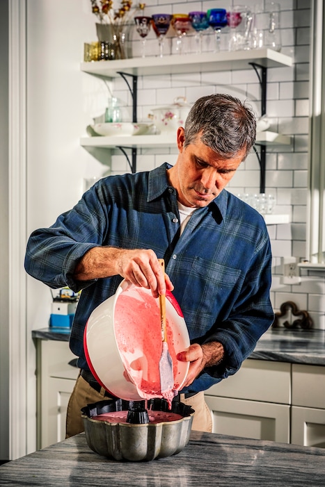 (Audra Melton | The New York Times) Jeffrey Zweben, a lawyer in Atlanta, who takes his annual Thanksgiving Jell-O mold seriously, prepares his signature mold at home on Nov. 23, 2019.