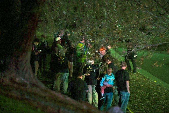 Walmart customers and employees are held back while emergency crews and police work on the grounds of Walmart during a shooting in Thornton, Colo., Wednesday, Nov. 1, 2017. Police in suburban Denver say they are responding to a shooting at a Walmart with "multiple parties down." Dozens of police cars and emergency vehicles converged at the store. (John Leyba/The Denver Post via AP)