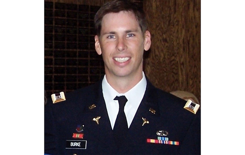 (Paul C. Burke) Major Matthew Patrick Burke served a tour as an orthopedic surgeon at Al-Asad Airbase in Iraq. Soon after returning from deployment, he was struck in training and killed in the line of duty.