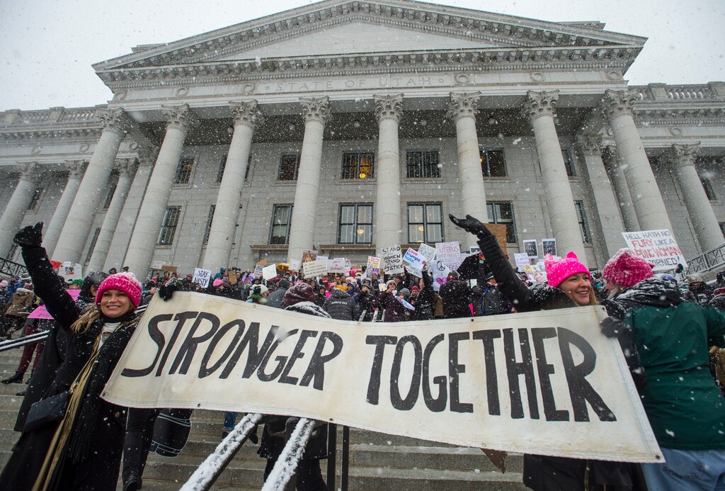 FILE - In this Monday, Jan. 23, 2017 file photo, thousands attend a women's march on the Capitol in Salt Lake City. The array of massive women's marches in January 2017, primarily a backlash to Donald Trump's election as president, served as prelude to the #MeToo movement, which caught fire in October and continues to this day as emboldened women call out men who have sexually mistreated them in workplaces ranging from Hollywood to state legislatures to symphony orchestras. (Steve Griffin/The Salt Lake Tribune via AP)