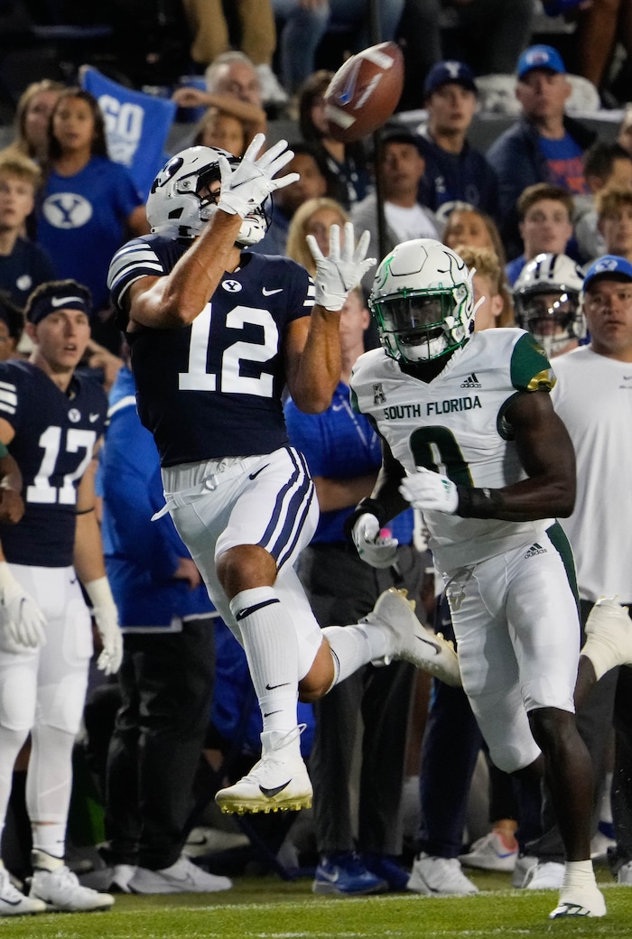 (Francisco Kjolseth | The Salt Lake Tribune) Brigham Young Cougars wide receiver Puka Nacua (12) pulls in a long pass in game action between the Brigham Young Cougars and the South Florida Bulls at LaVell Edwards Stadium in Provo, Saturday, Sept. 25, 2021.