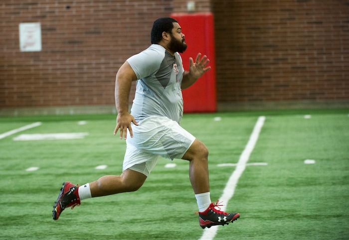 (Rick Egan  |  The Salt Lake Tribune)      Lowell Lotulelei, runs the 40-yard-dash, during University of Utah's 2018 Pro Day for NFL scouts, at Spence Eccles Field House, Wednesday, March 28, 2018.