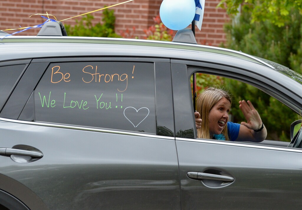 (Francisco Kjolseth  |  The Salt Lake Tribune) The Highland Park Elementary PTA hosts a "teacher parade," on Friday, May 1, 2020, in Salt Lake City as teachers and staff drive along most of the school boundary streets to celebrate teachers and students during the coronavirus pandemic which closed down schools.