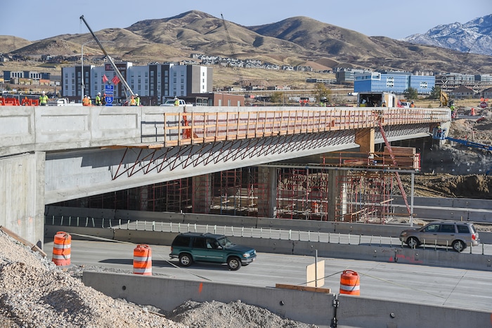 (Francisco Kjolseth  |  The Salt Lake Tribune)  UDOT completes the first stage of the new Triumph Blvd bridge in Lehi, opening East to West traffic on Thursday, Nov. 1, 2018, as part of the I-15 Technology Corridor Project.