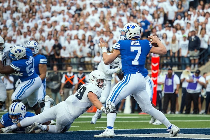 (Chris Detrick  |  The Salt Lake Tribune)  Brigham Young Cougars quarterback Beau Hoge (7) throws the ball during the game at Merlin Olsen Field at Maverik Stadium Friday, September 29, 2017.