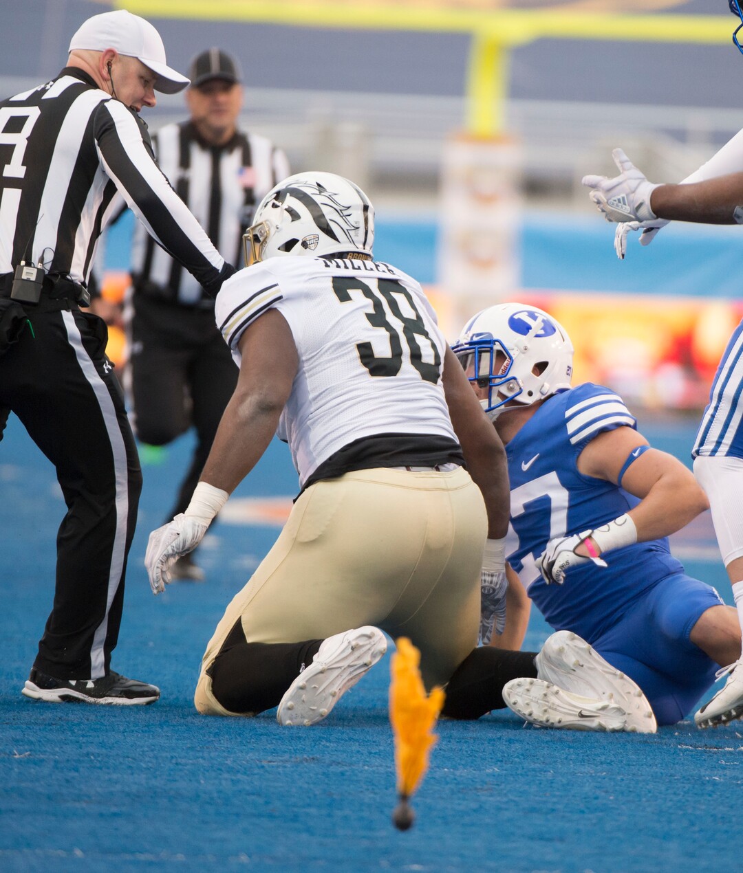 (Jeremy Harmon  |  The Salt Lake Tribune) A flag goes down on the field after Western Michigan Broncos tight end Odell Miller (38) tangled with Brigham Young Cougars defensive back Gavin Fowler (27) as BYU faces the Western Michigan Broncos in the Famous Idaho Potato Bowl in Boise, Idaho, on Friday, Dec. 21, 2018.