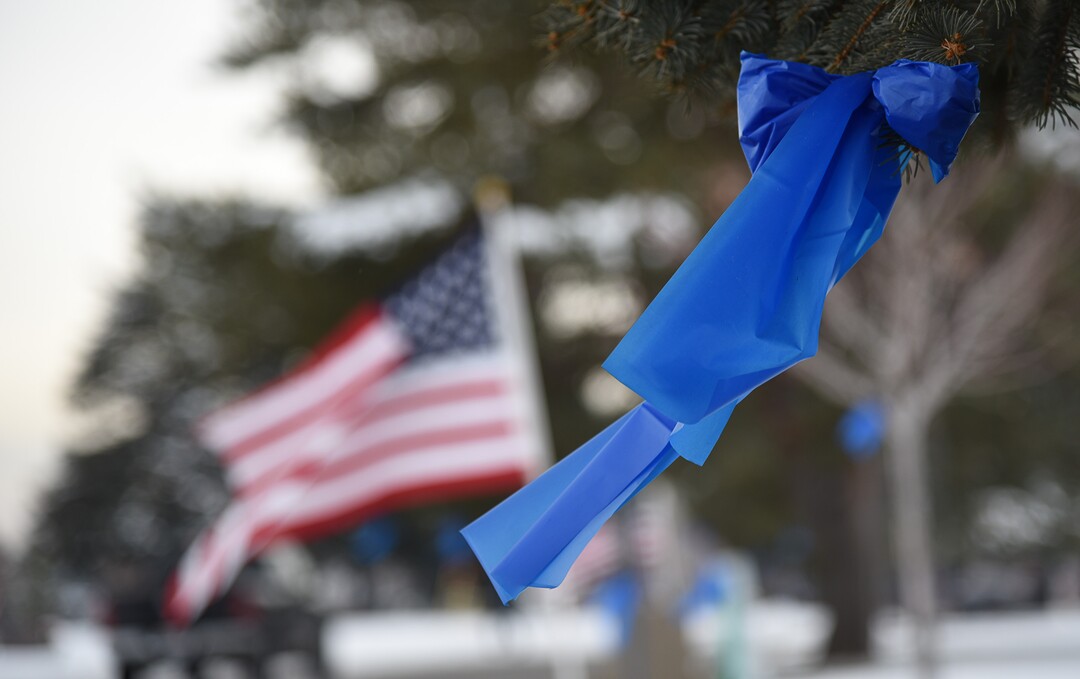 (Francisco Kjolseth  |  The Salt Lake Tribune)  Blue ribbons line the trees in anticipation of police officer David Romrell's funeral services at Larkin Sunset Gardens Cemetery in Sandy, Wed. Dec. 5, 2018.