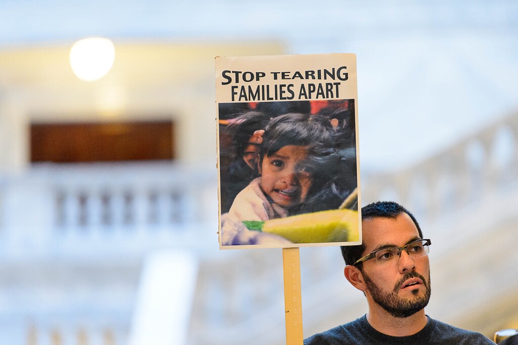 (Trent Nelson | The Salt Lake Tribune)  Leonel Nieto holds a sign at a rally at the State Capitol building in Salt Lake City to "remind Senator Hatch and Senator Lee that DACA is #HereToStay, Thursday August 31, 2017.
