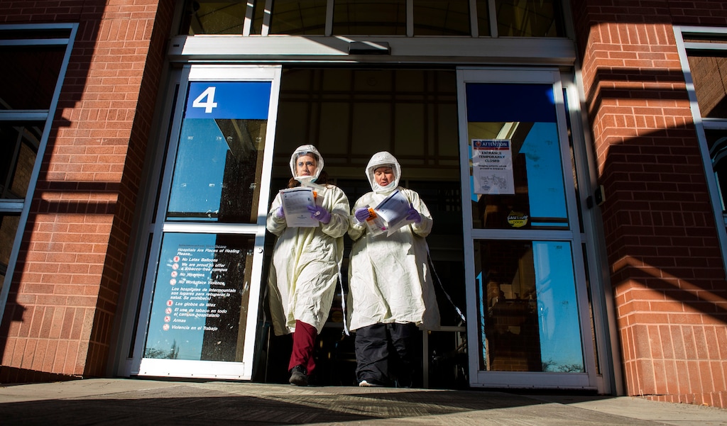 (Rick Egan | The Salt Lake Tribune)  Taylor Woodrow and Christy Danielsontest for Covid-19 at the Intermountain Healthcare Cottonwood InstaCare on Friday, Dec. 4, 2020.