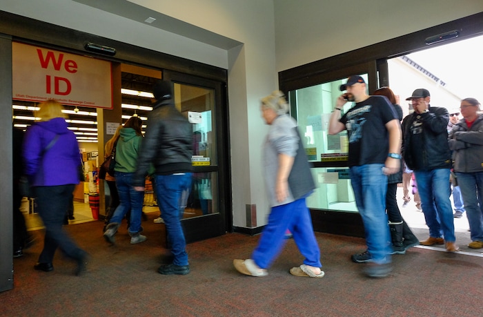 (Francisco Kjolseth | The Salt Lake Tribune) The day before Thanksgiving is the busiest day of the year at Utah's state-run liquor stores, and the store in Cottonwood Heights at 1863 E. Fort Union Blvd., makes the most sales in the state as people walk in moments after the doors open for the day.