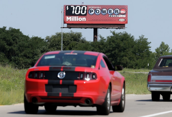A billboard advertising the Powerball jackpot stands in Bellevue, Neb., Wednesday, Aug. 23, 2017. Lottery officials said the grand prize for Wednesday night's drawing has reached $700 million. The second -largest on record for any U.S. lottery game. (AP Photo/Nati Harnik)