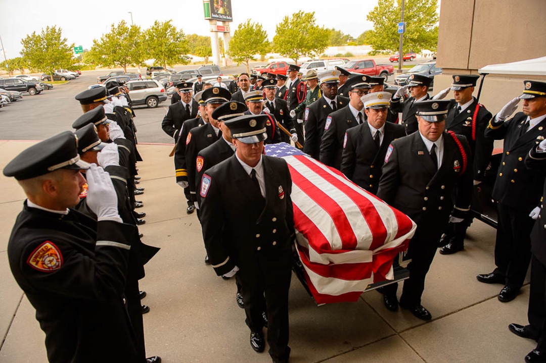 (Trent Nelson | The Salt Lake Tribune)  Honor Guard at the funeral services for Battalion Chief Matthew Burchett at the Maverik Center in West Valley City, Monday Aug. 20, 2018.
