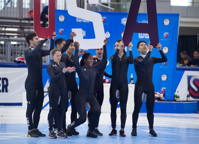 (Scott Sommerdorf   |  The Salt Lake Tribune)   
The USA Olympic short track team, including Maame Biney, center, holding the "S" as they celebrate at the end of the U.S. short-track Olympic Team Trials at the Utah Olympic Oval, Sunday, December 17, 2017.  
