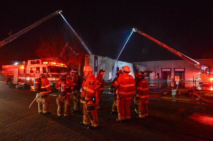 (Francisco Kjolseth | The Salt Lake Tribune) Crews from multiple agencies battled a fire Sunday night that broke out at South Valley Specialties at 9320 S. 547 West in Sandy. The building, where the company makes custom rubber moldings and other products, was declared a complete loss. The cause of the blaze is under investigation.